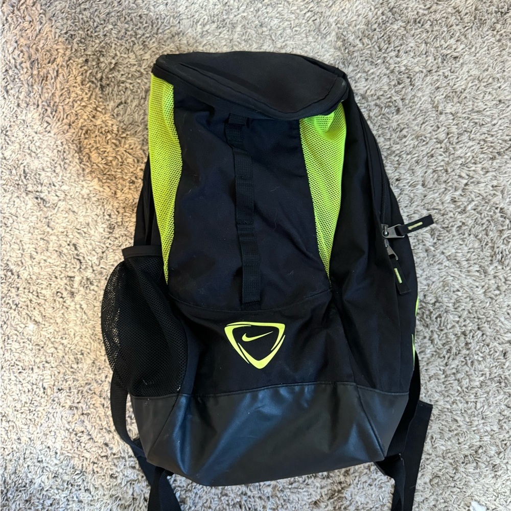 Nike Black and Green Backpack with Durable Fabric and Reflective Logo